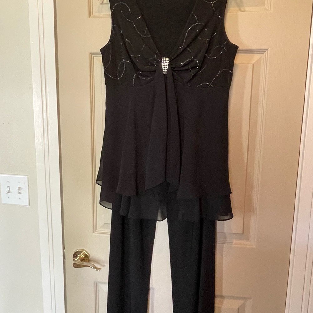 Two piece Black Special Occasion outfit, with sparkle and sequin-like detail.
